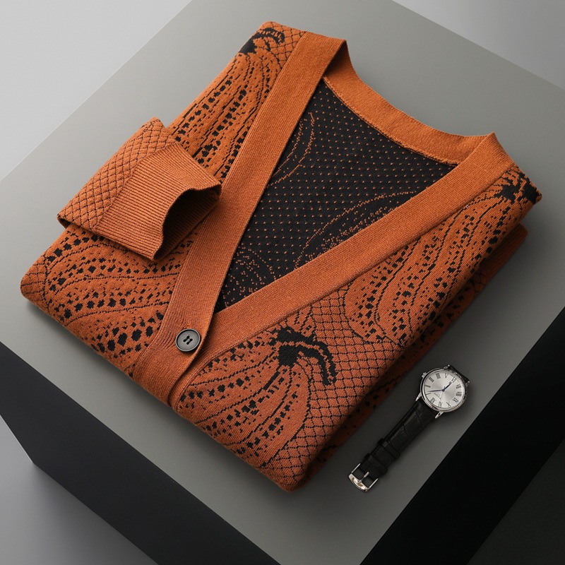 "Men's wool sweater with a 3D pumpkin knit pattern."