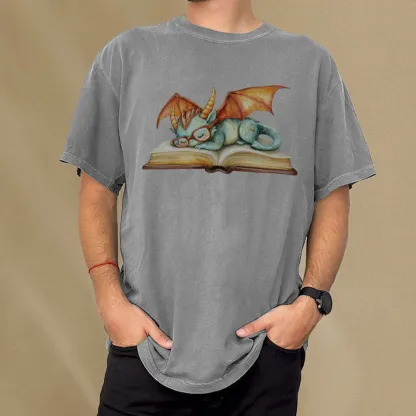 Pagewings Cute Green Dragon Sleeping Peacefully On A Large Open Book Unisex Washed T-shirt