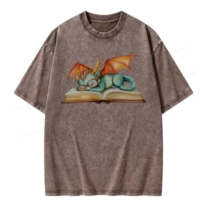 Pagewings Cute Green Dragon Sleeping Peacefully On A Large Open Book Unisex Washed T-shirt