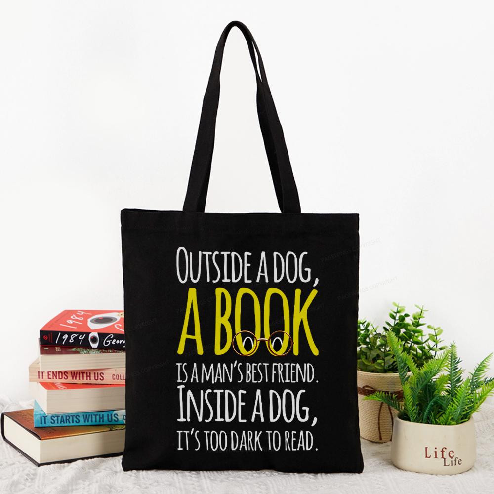 Pagewings Outside a dog a book is a mans best friend Funny Tote Bag