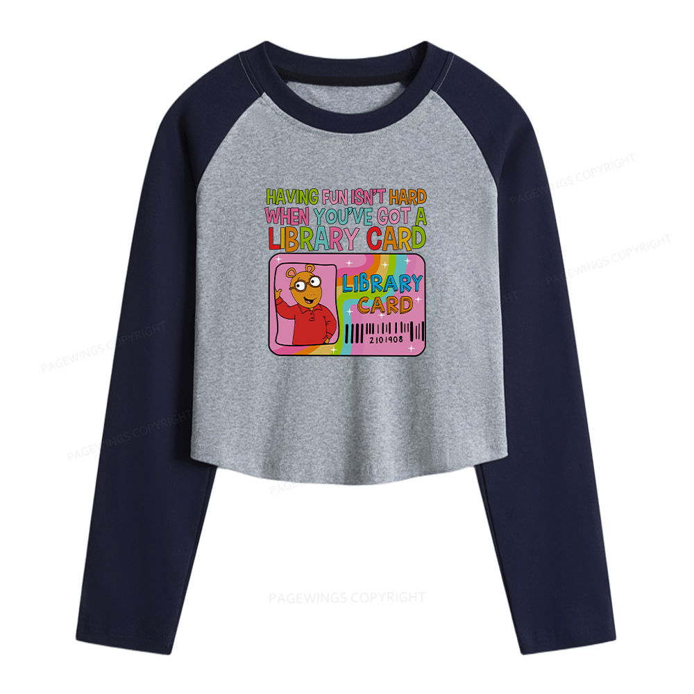 Pagewings Got A Library Card Women Long Sleeve Crop Raglan T-shirt