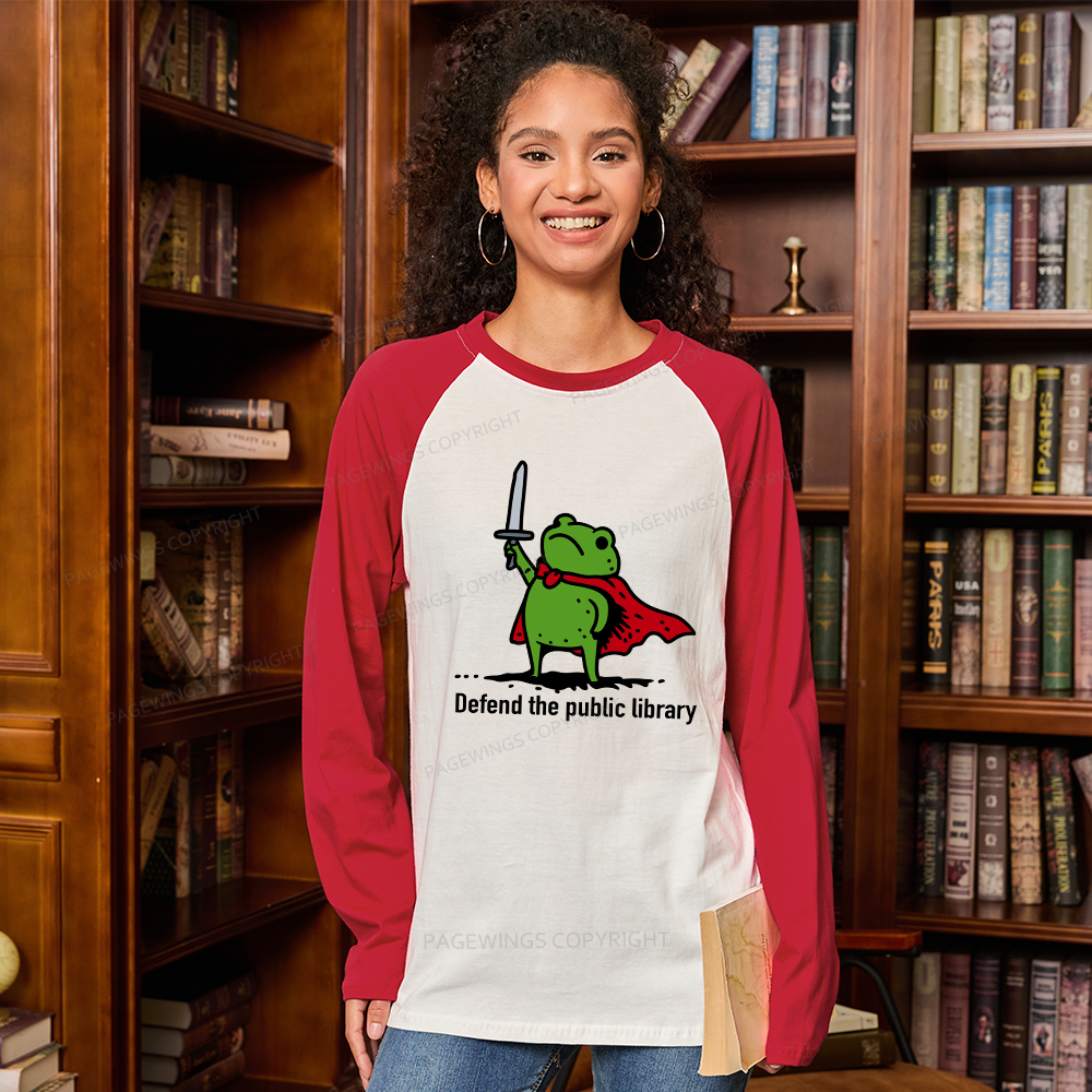 Pagewings Defend The Public Library Long Sleeve Raglan T-shirt