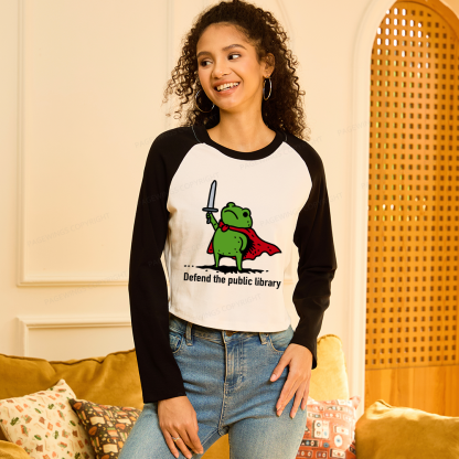 Pagewings Defend The Public Library Women Long Sleeve Crop Raglan T-shirt