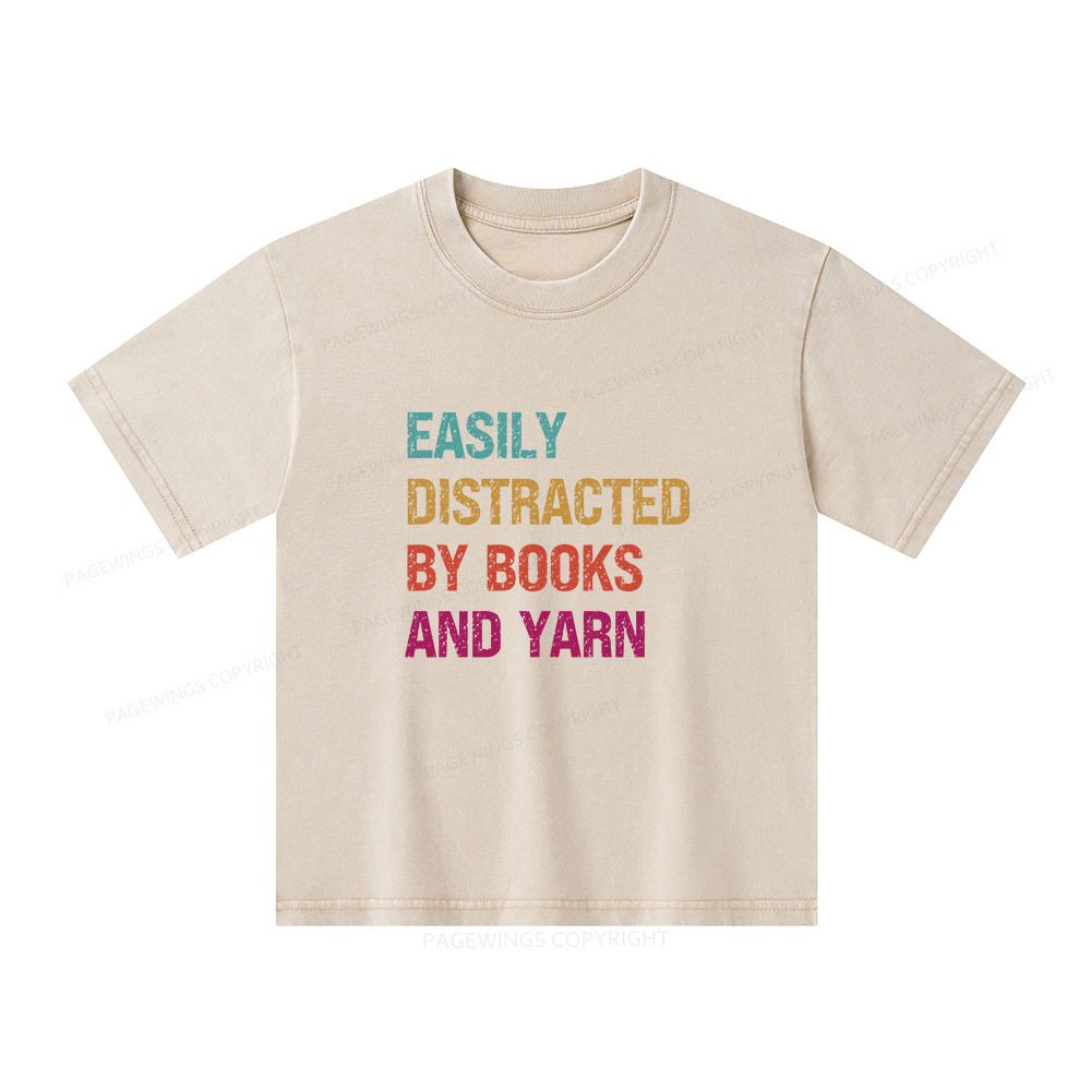 Pagewings Easily Distracted By Books And Yarn Unisex Kids Washed T-shirt