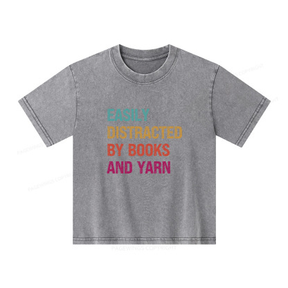 Pagewings Easily Distracted By Books And Yarn Unisex Kids Washed T-shirt