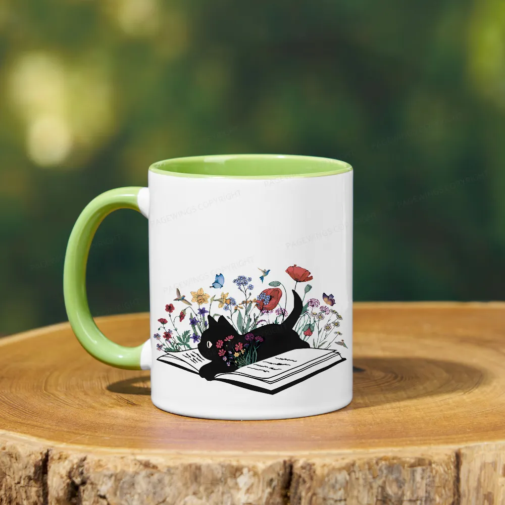 Pagewings The Cat Is Lying On The Book Mug