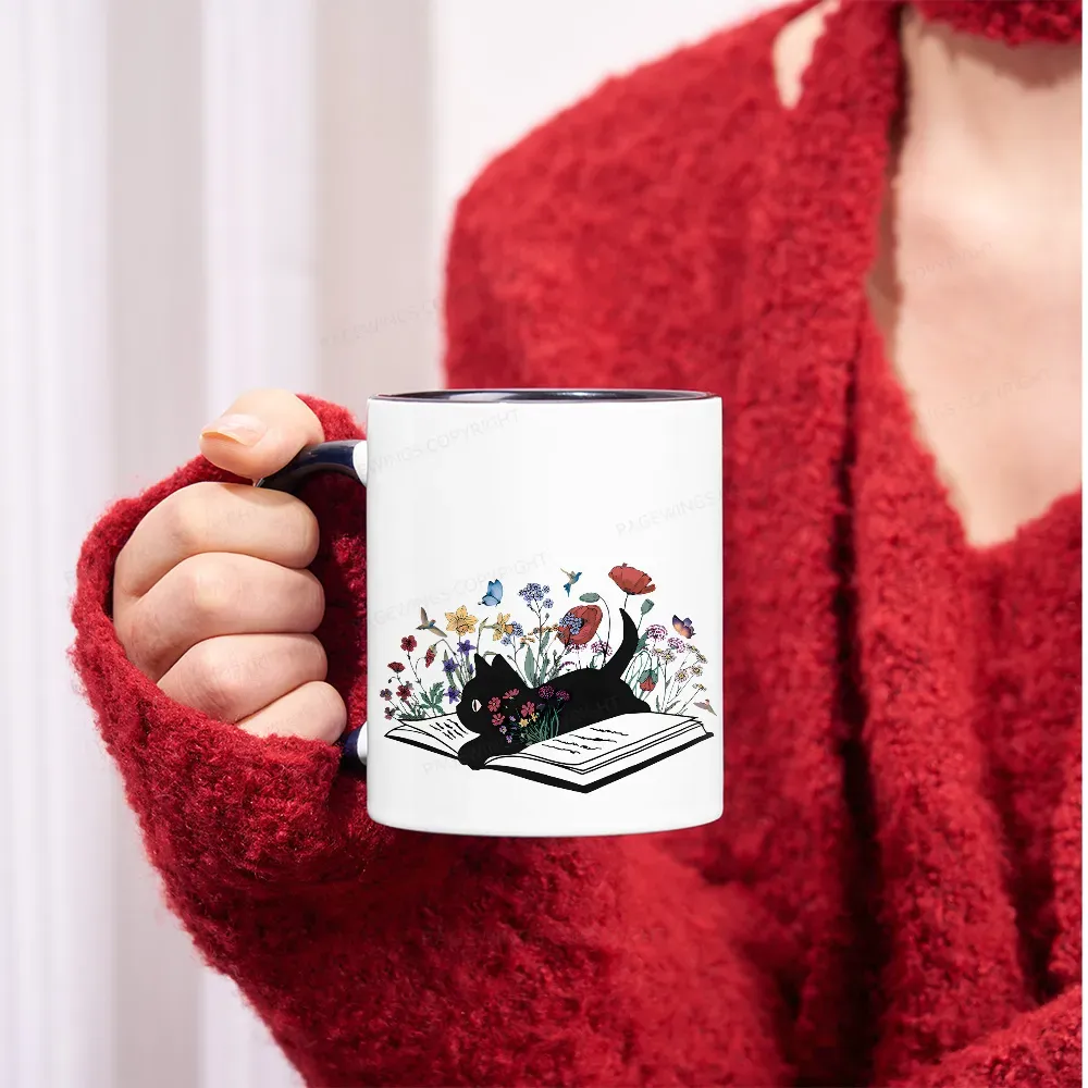 Pagewings The Cat Is Lying On The Book Mug