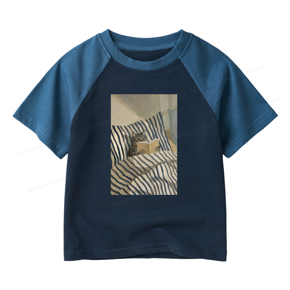 Pagewings Cat Reading Book In Bed Kids Raglan T-shirt 