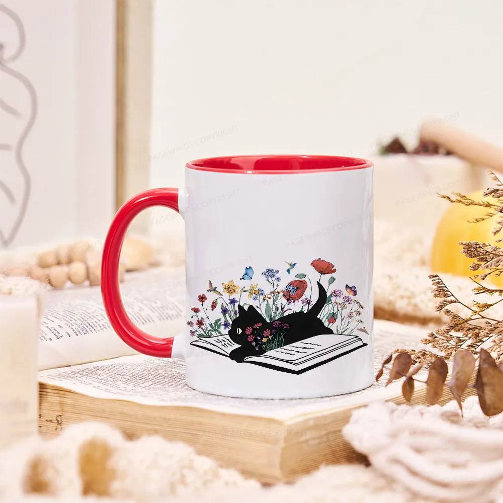 Pagewings The Cat Is Lying On The Book Mug
