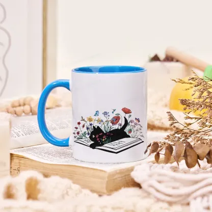 Pagewings The Cat Is Lying On The Book Mug