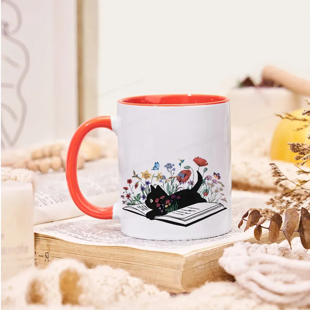 Pagewings The Cat Is Lying On The Book Mug