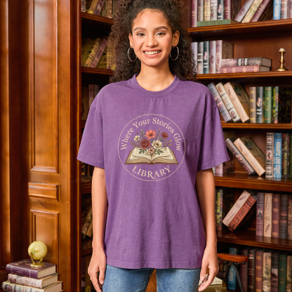 Pagewings Where Your Stories Glow Library Unisex Washed T-shirt