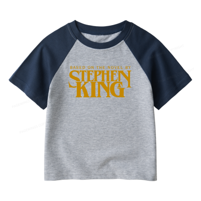 Pagewings Based On A Novel By Horror Writer Kids Raglan T-shirt 