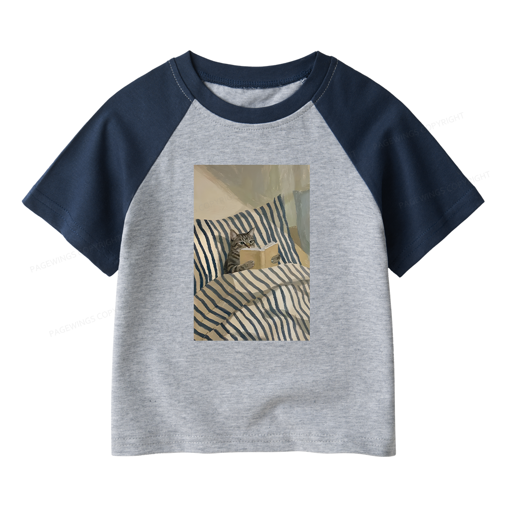Pagewings Cat Reading Book In Bed Kids Raglan T-shirt 
