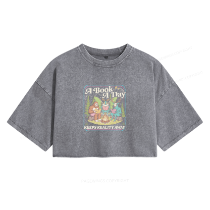 Pagewings A Book A Day Keeps Reality Away Women's Washed Cropped T-shirt