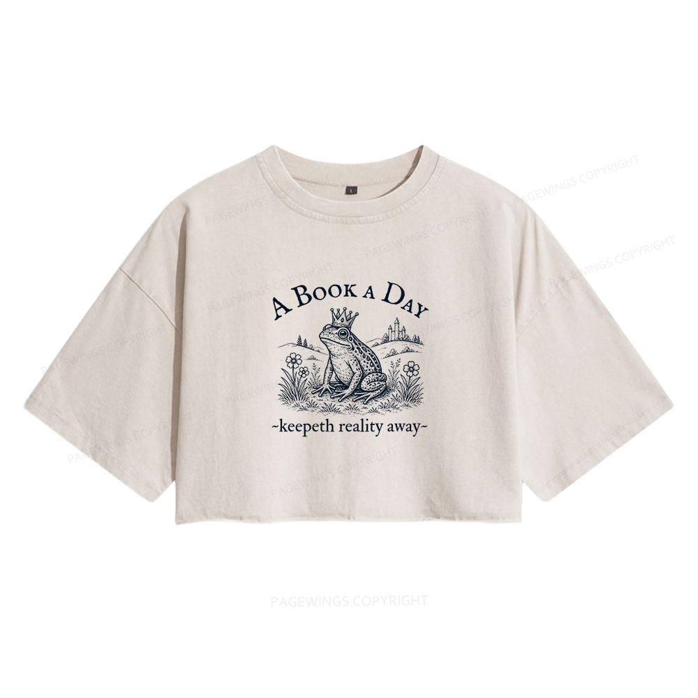Pagewings A Book A Day Keeps Reality Away Women's Washed Cropped T-shirt