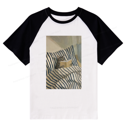 Pagewings Cat Reading Book In Bed Raglan T-shirt
