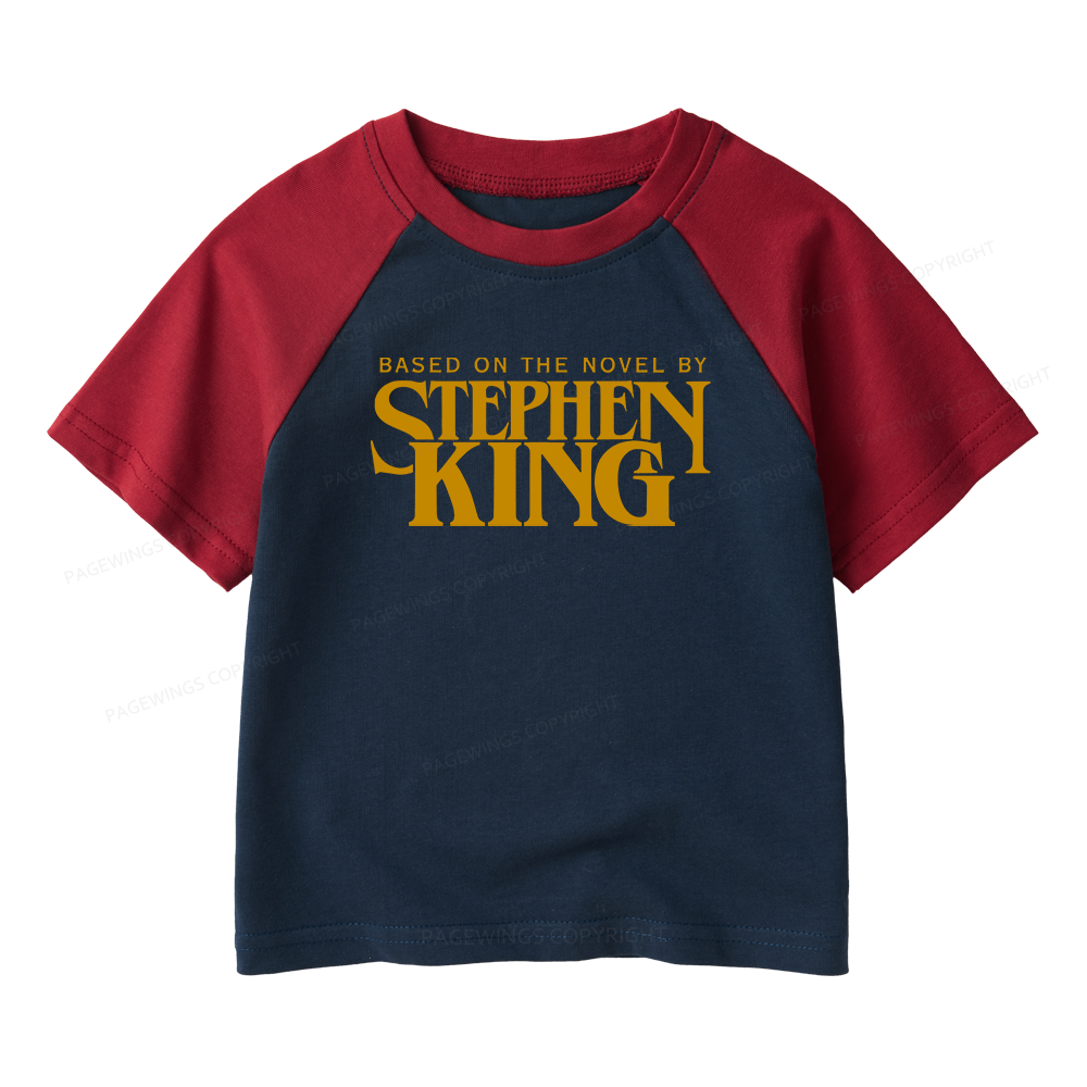 Pagewings Based On A Novel By Horror Writer Kids Raglan T-shirt 