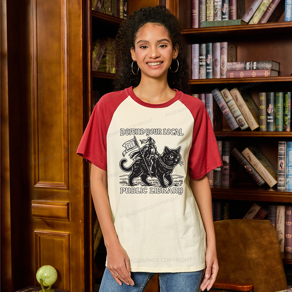 Pagewings Defend Your Local Public Library Raglan T-shirt