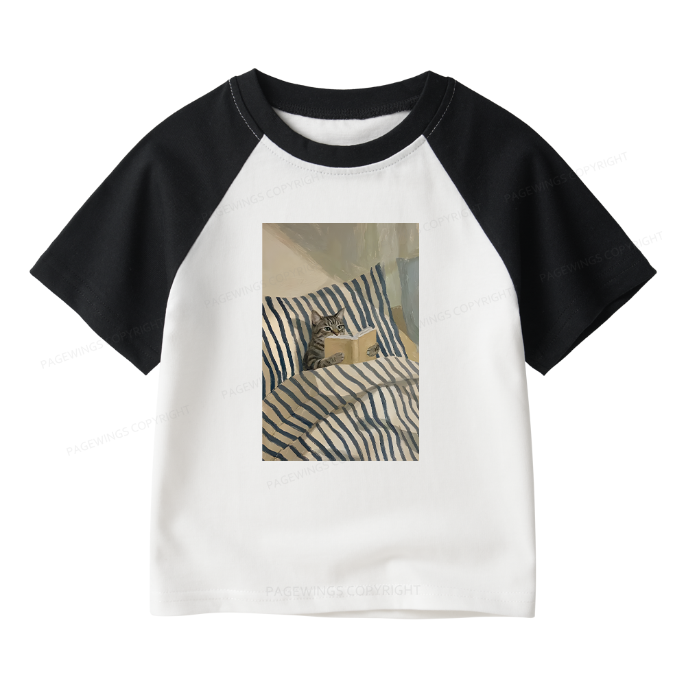 Pagewings Cat Reading Book In Bed Kids Raglan T-shirt 