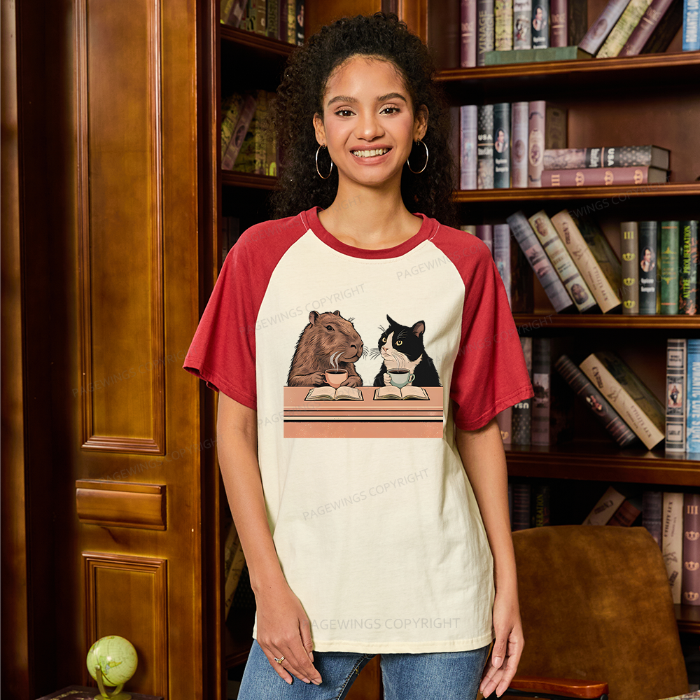 Pagewings Capybara and Tuxedo Cat 11180 Bookish Raglan T-shirt