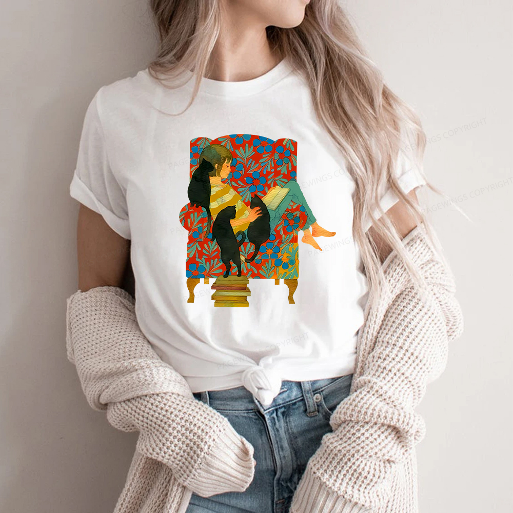 Pagewings A girl reading a book on the sofa Unisex Classic T-shirt
