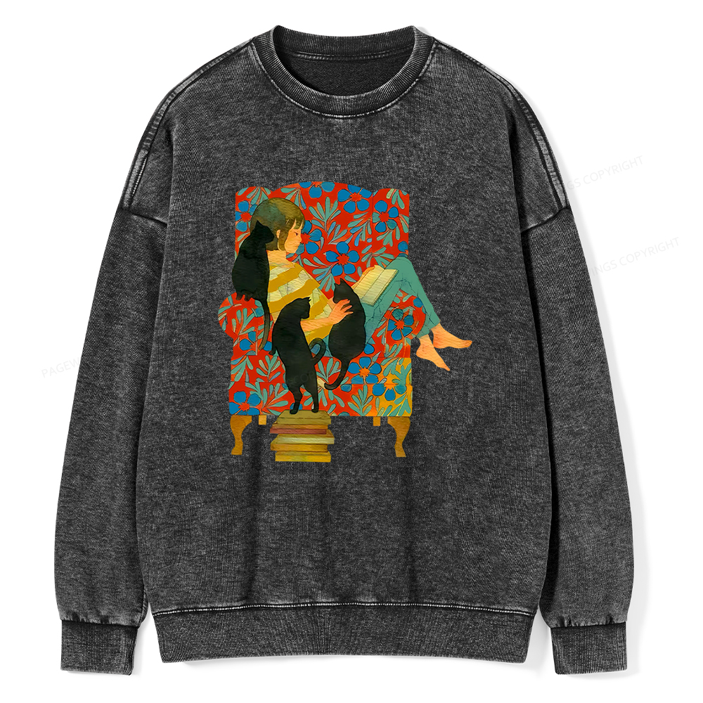 Pagewin A girl reading a book on the sofa Unisex Washed Sweatshirt