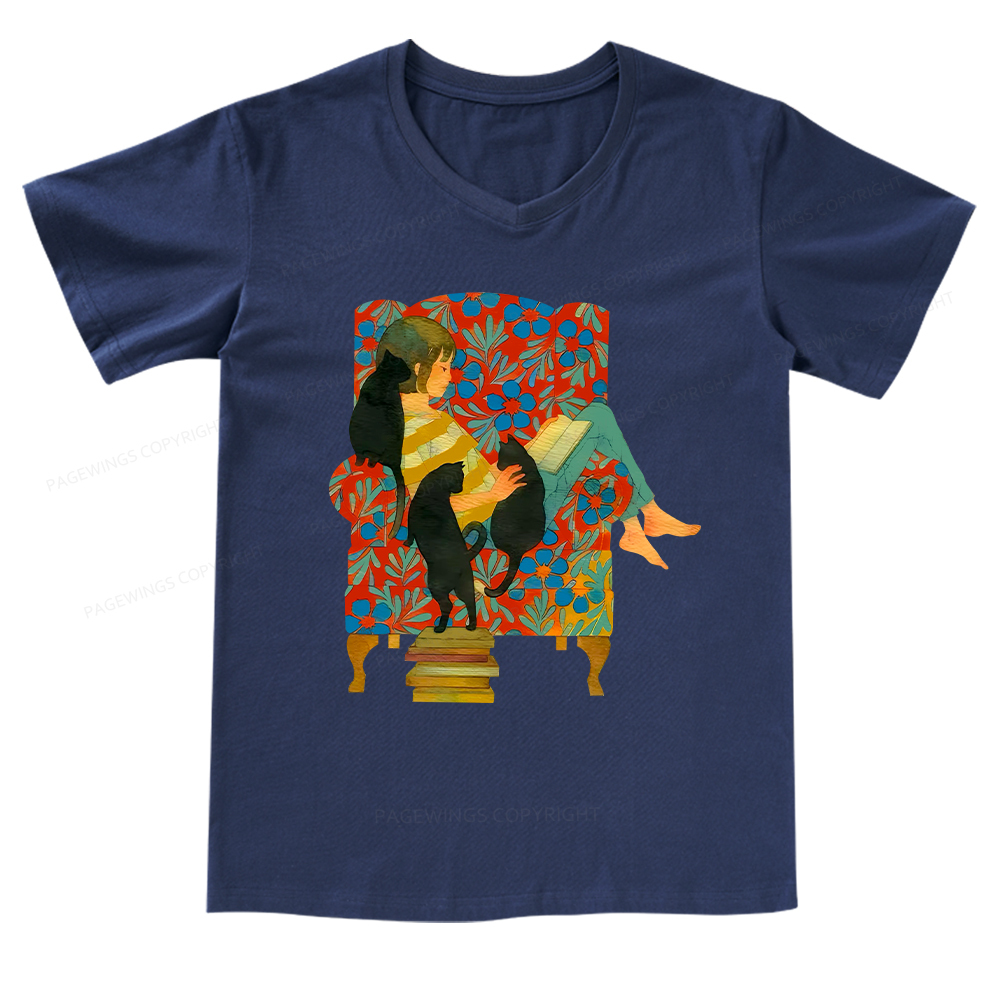 Pagewings A girl reading a book on the sofa V-neck T-shirt