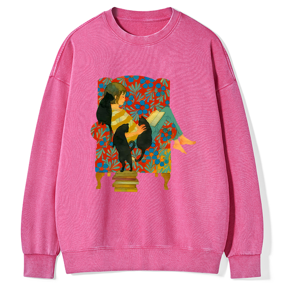 Pagewin A girl reading a book on the sofa Unisex Washed Sweatshirt
