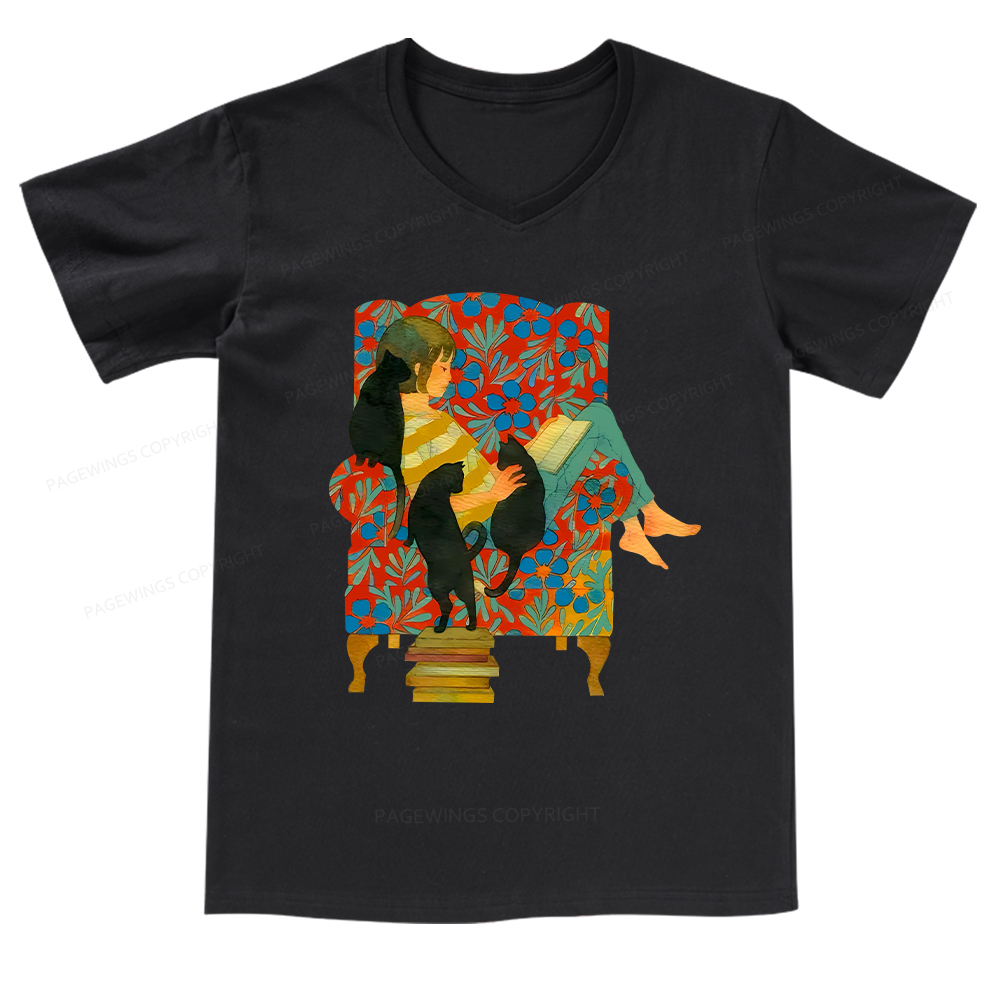 Pagewings A girl reading a book on the sofa V-neck T-shirt