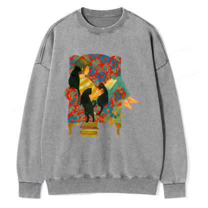 Pagewin A girl reading a book on the sofa Unisex Washed Sweatshirt