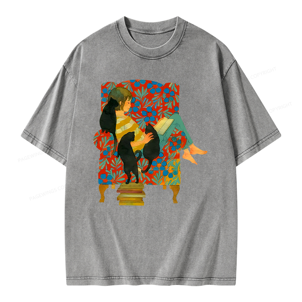 Pagewing A girl reading a book on the sofa Unisex Washed T-shirt