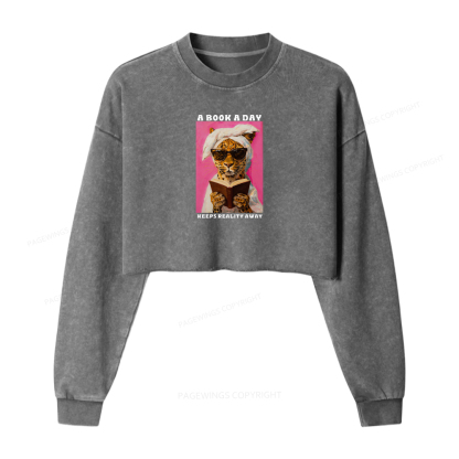 Pagewings A Book A Day Keeps Reality Away Washed Crop Sweatshirt