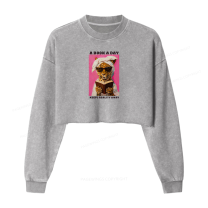 Pagewings A Book A Day Keeps Reality Away Washed Crop Sweatshirt