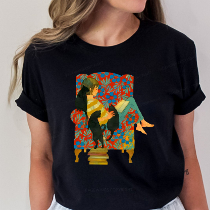 Pagewings A girl reading a book on the sofa Unisex Classic T-shirt