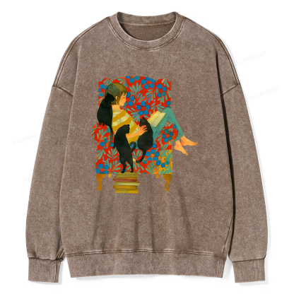 Pagewin A girl reading a book on the sofa Unisex Washed Sweatshirt