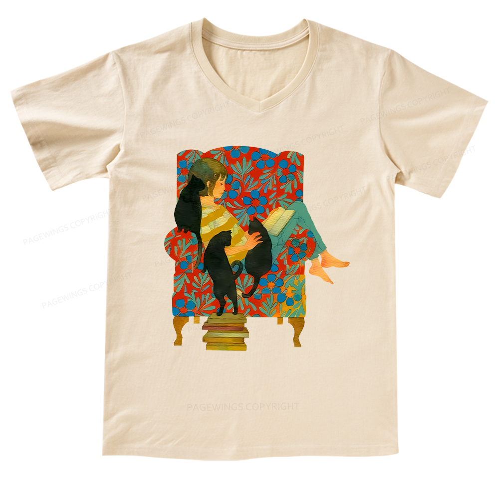 Pagewings A girl reading a book on the sofa V-neck T-shirt