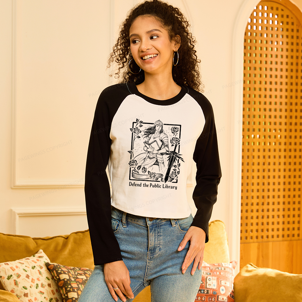 Pagewings Defend The Public Library Women Long Sleeve Crop Raglan T-shirt