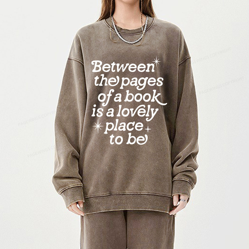 Pagewings Betwwen The Pages Of A Book Is A Lovely Place To Be Unisex Washed Sweatshirt