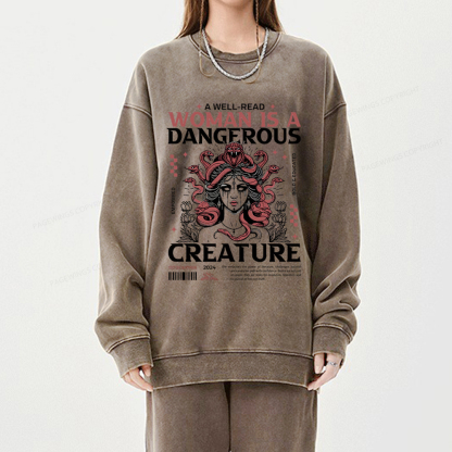 Pagewings A Well-Read Woman is A Dangerous Unisex Washed Sweatshirt