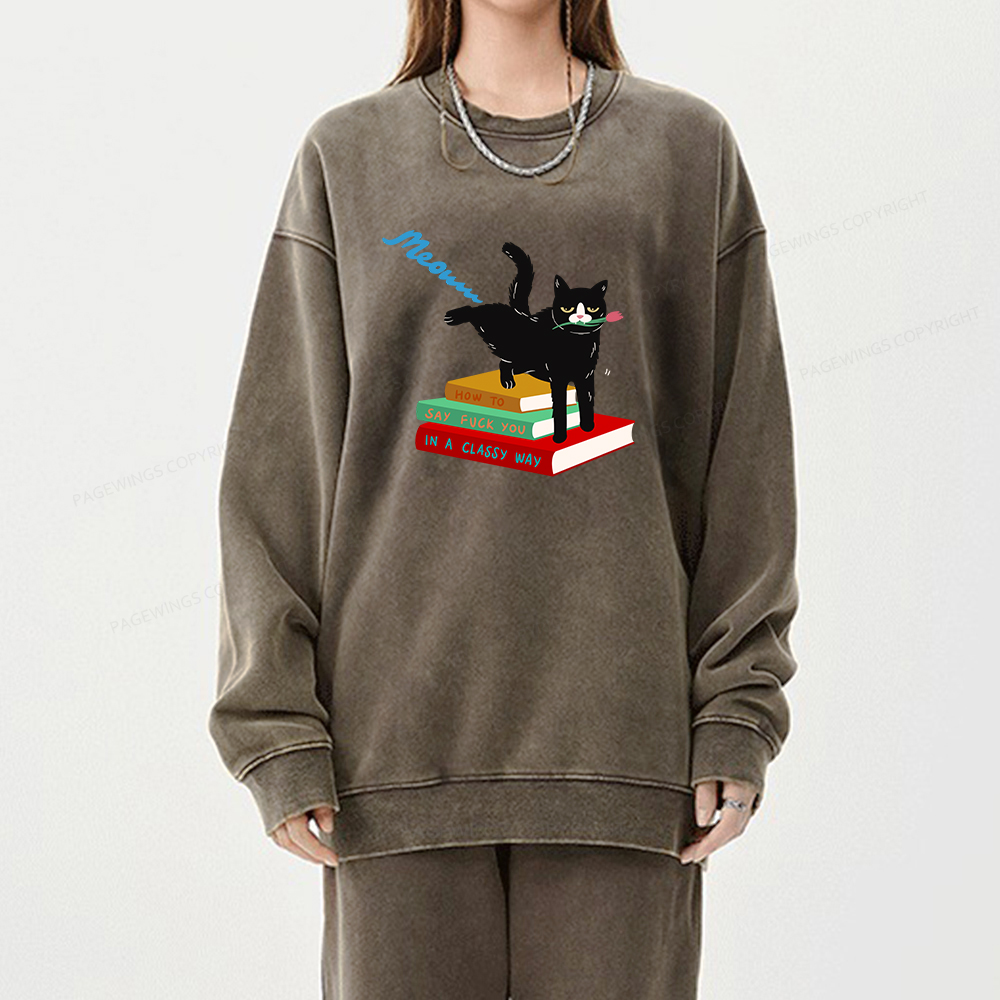 Pagewing A handsome cat standing on a book Unisex Washed Sweatshirt