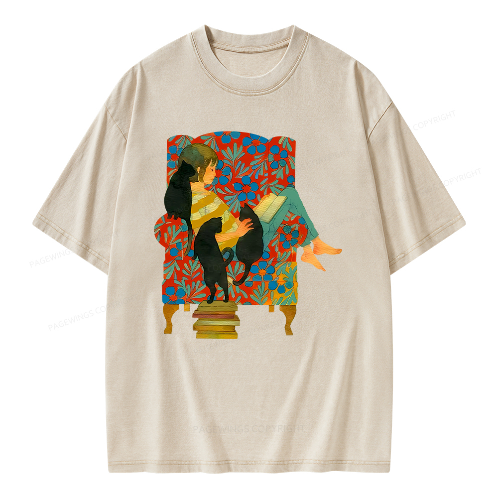 Pagewing A girl reading a book on the sofa Unisex Washed T-shirt