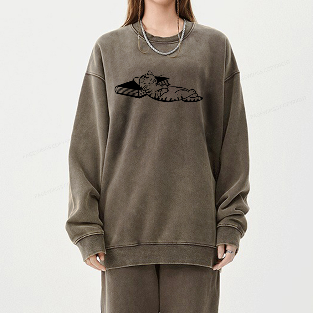 Pagewings A Cat Sleeping On The Book Unisex Washed Sweatshirt