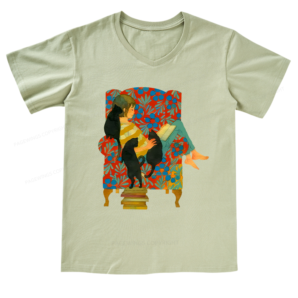 Pagewings A girl reading a book on the sofa V-neck T-shirt