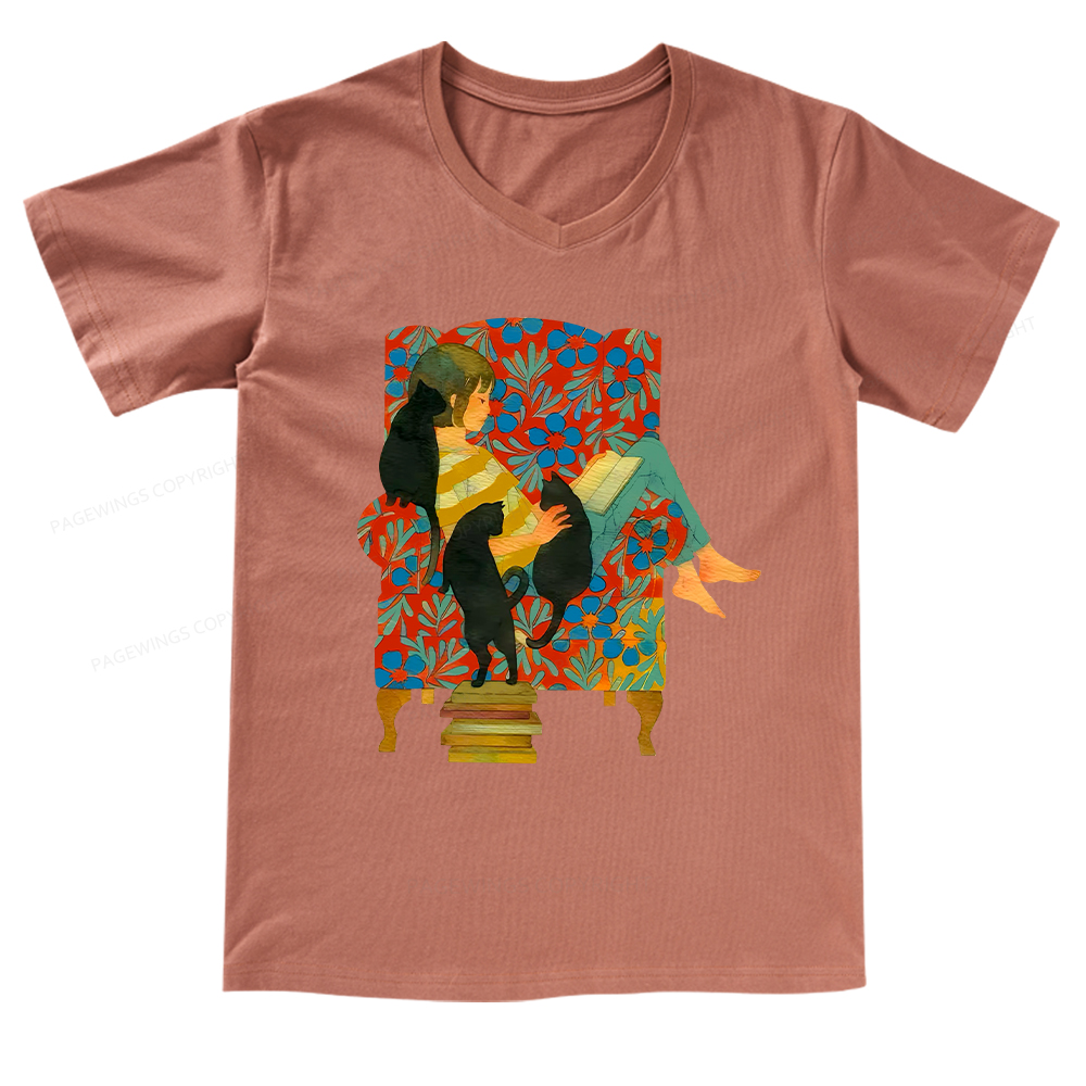 Pagewings A girl reading a book on the sofa V-neck T-shirt