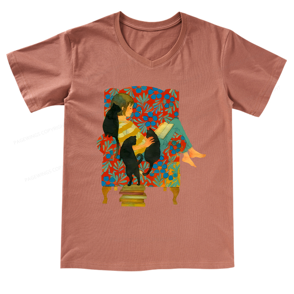 Pagewings A girl reading a book on the sofa V-neck T-shirt
