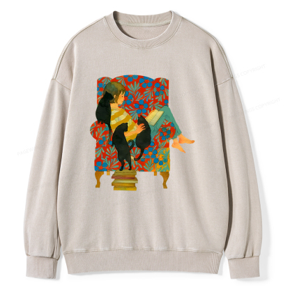 Pagewin A girl reading a book on the sofa Unisex Washed Sweatshirt