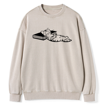 Pagewings A Cat Sleeping On The Book Unisex Washed Sweatshirt