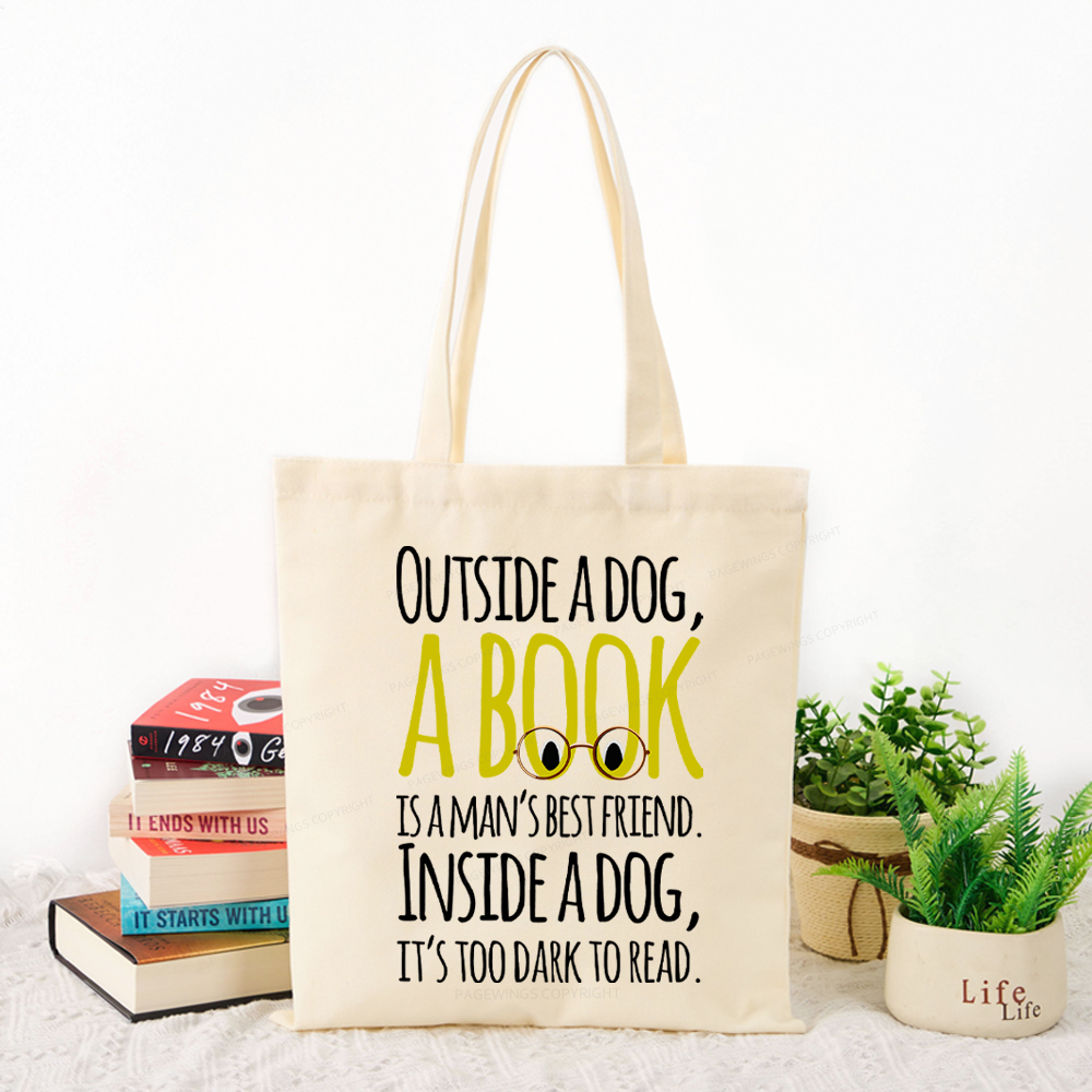Pagewings Outside a dog a book is a mans best friend Funny Tote Bag