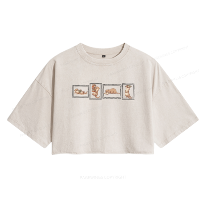 Pagewing Otter Reading Women's Washed Cropped T-shirt